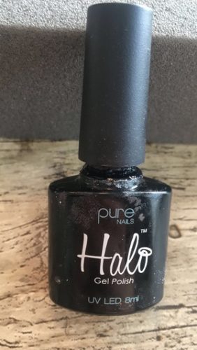 Incorrect working technique has been used - resulting in product on the outer bottle neck & curing