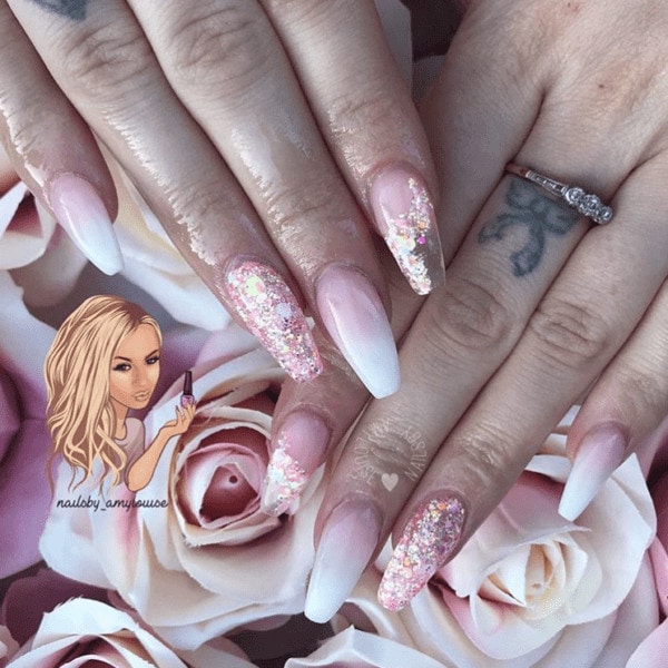 Pink glitter shines in this design by @nailsby_amylouise