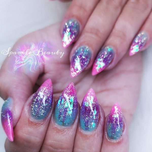 Glittering blue and pink tones from @sparkle_beautysalon