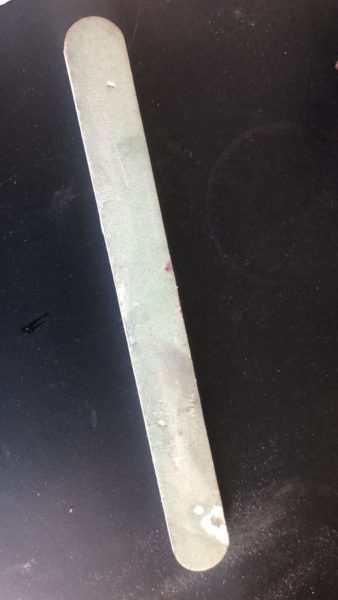 As well as this file looking unsanitary with contamination from products, it also has dents and scratches showing that too much pressure has been used to get the desired effect.