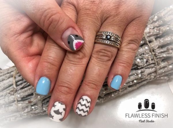Natasha at Flawless Finish Nail Studio adds thumbnail detailing  
