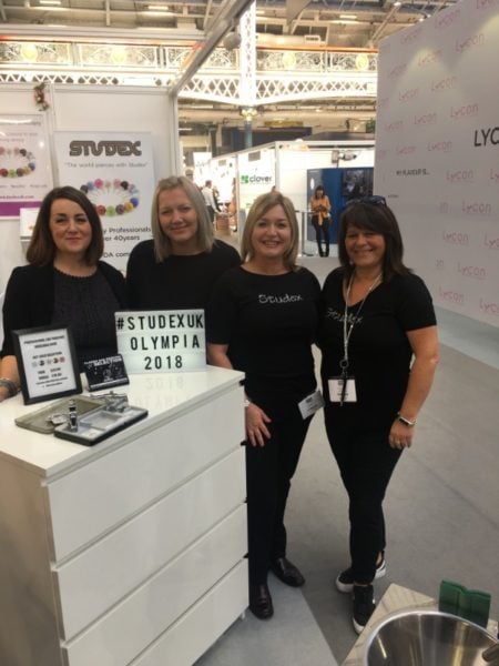 The Studex UK team pose for a pic in between ear piercing