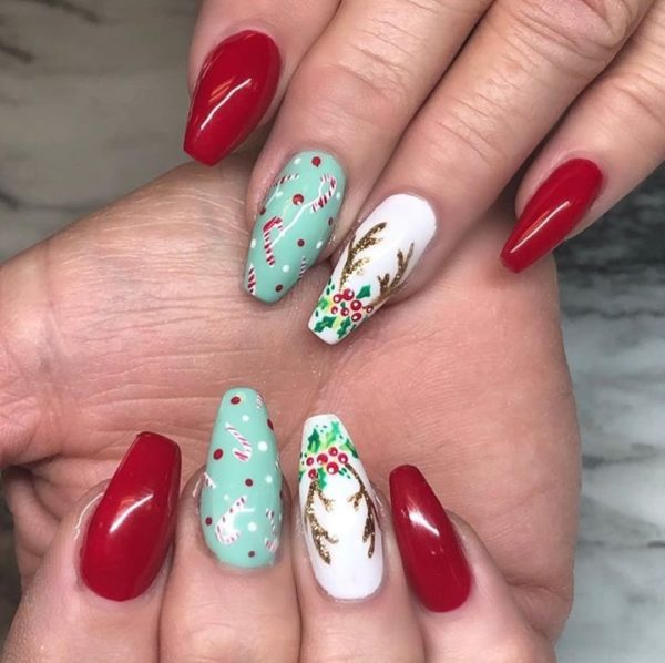 Kaylee at Gossip Girls Salon decorated antlers with jolly holly sprigs 