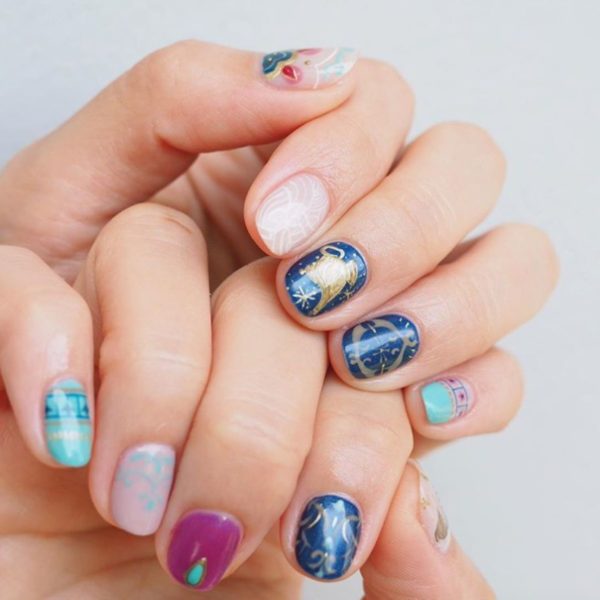 The team at Hugs x Kisses Nails Bar detail the shining gold lamp