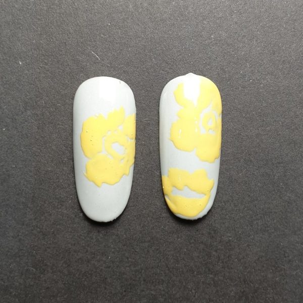 Step 1: Paint nails in pre mixed colour to match the dress – paint two coats. Using yellow gel polish, paint flower petals following the flower pattern from the fabric. Cure.