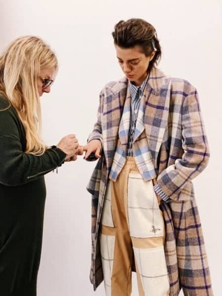 Marian Newman tending to the nails of a model