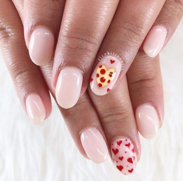 With a glossy nude base, this set by Diana Nguyen has got a pizza our hearts