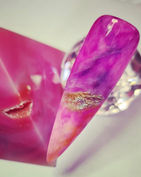 Senay Tayfur
"My entries represent my spirituality and ability to connect and heal using crystals. I have been practising energy work and clairvoyance for many years, where my crystals have played a big part in assisting me, especially my pendulum. Even though Covid-19 has sadly been an unfortunate experience, it gave me the time to showcase my passion for crystals by expressing their beauty on nails. My entries may not contain an image of me or another person, but I feel where crystals are concerned, they speak for themselves."