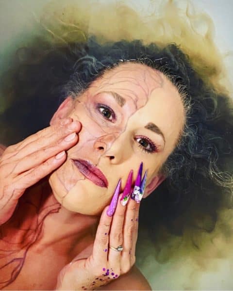 Carly Dorman
"This is me. I have chosen mental health as it’s something I have suffered with for many years the dark and the bright side suffering from many traumatic past events , the dark side showing the inner hidden pain and not wanting nails or any thing done feeling broken inside the hidden pain that isn’t clear for others to see the way mental health can effect our body to. The bright side having make up, hair and full nails done shining bright and standing proud. I have used the art of one stroke as find this so therapeutic for my mental health, roses are one of my favourite flowers which represents growth, the butterfly represents change, the crystals represent to keep shining bright. Using the nailchemy’s beautiful minds gel polish’s, acrylic and crystals from Crystal Parade. Model- make up- hair- nails - myself. Photography - My husband"