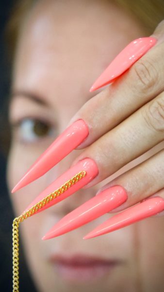 Nicole Dowling
"I've titled my entry 'Behind the Nails'. In my day to day general life I am the most confident out going person, always the life of the party BUT for some reason i struggle to talk about my self when it comes to my job. If anyone asked what I do for a living a just say "I'm a nail tech " I never mention I'm a buisness owner of 16 years, an educator for pure nails and a waiting list for clients. I feel terribly uncomfortable when I talk about my career I'd rather the ground swallowed me up ! I prefer my nails to do the talking rather then me hence my titled image - I feel it's the perfect representaion of me and my life in the nail industry."