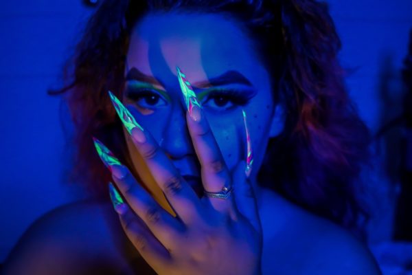 Aimee Connelly
"I like to think of myself as rather out going and creative. I’ve tried to express that through both the image itself and my nails. I love bright colours and standing out from the crowd so I feel like this is a true reflection of myself."