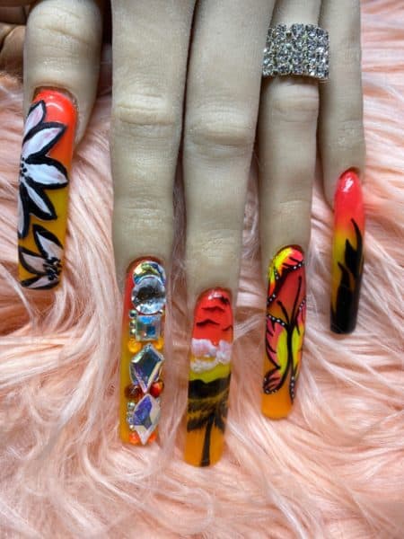 Idalia Lopez
"This art expresses how I have come out of the Pandemic Ready and the new me! The flowers: means I have blossomed; The Rhinestones: signifies my love for bling (Diamonds)!; The Birds, and Clouds wth the mountains and the Palm Tree justifies, how long it took to get here; The Butterfly: Justifies how I am ready to fly and ready to show the world what I really am about; and last but not least; The Fire justifies,that "this girl is on Fire"! and I'm not talking about Alicia Keys :) I'm Ready to tackle the world..."