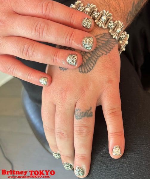 Celeb manicurist, Britney Tokyo, was behind this jewellery-matching look for member of Swedish House Mafia, 
Sebastian Ingrosso. The nail stylist also helped run Harry Styles' Coachella pop-up nail bar for his brand, Pleasing. @britneytokyo