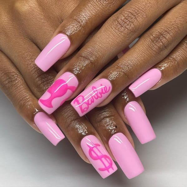 US pro & celeb nail stylist, Daisy of @lilflowernails, features Barbie symbols on Aprés Gel-X Tips in Natural Square Medium.