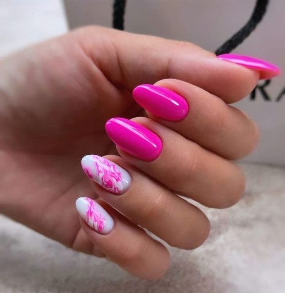 Pink and white marbling makes for a mesmerising nail look, courtesy of Iran salon, @shirincheraghchi_beauty.