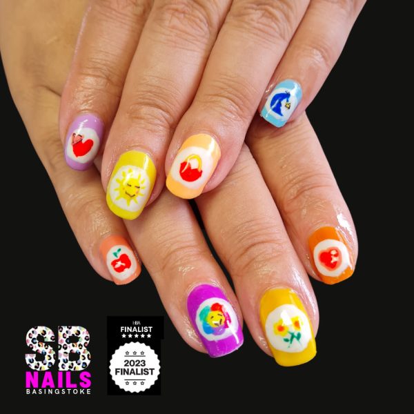 Sonia Brown paints Care Bear bellies