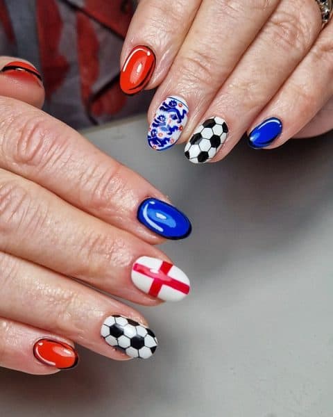 Georgina Duffy of @whenbeautycallsbygeorgina paints footballs, England emblems and pop art styles in this design