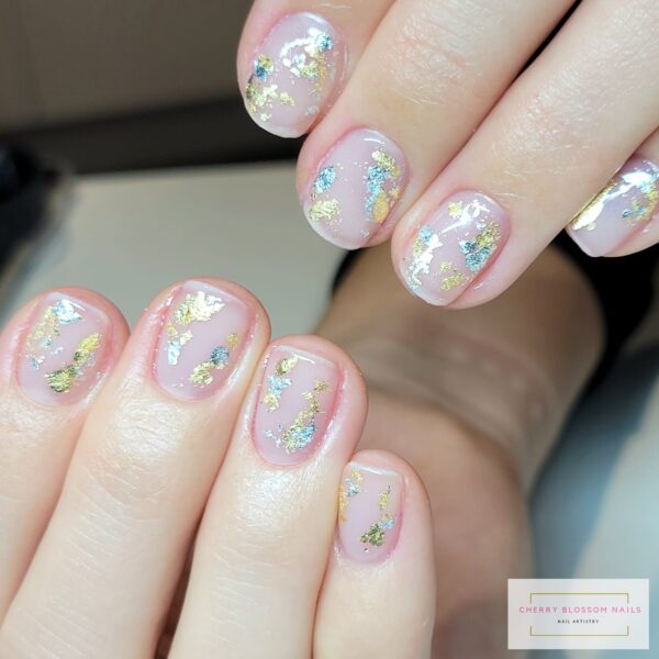 Claire Wright Wager - Foil nails are her 2023 trend prediction