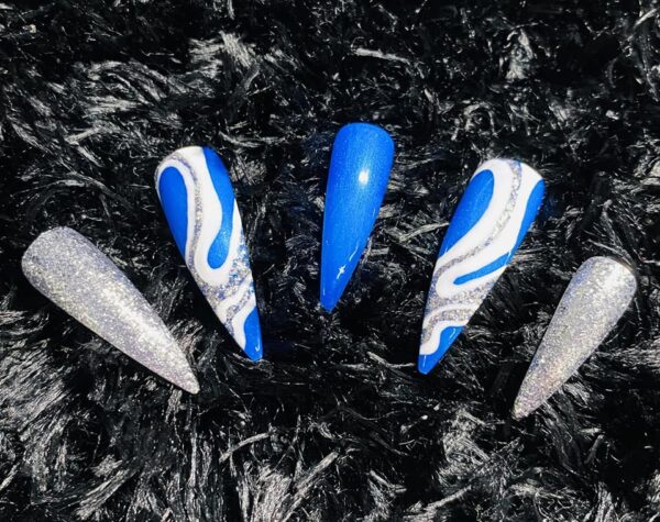 Jodie Foster - "Glitter, shimmer and freehand nail art swirls"