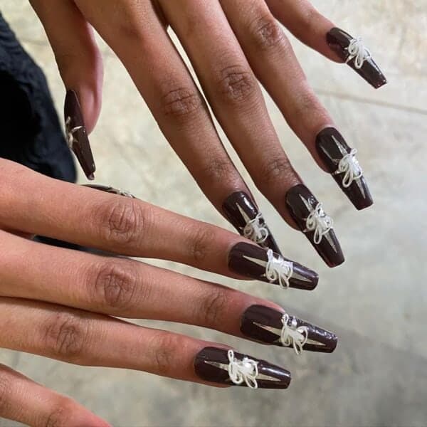 Luar went big on 3D embellishments, thanks to Naomi Yasuda, who created a variety of looks – most of which incorporated the brand's logo. Image: @naominailsnyc