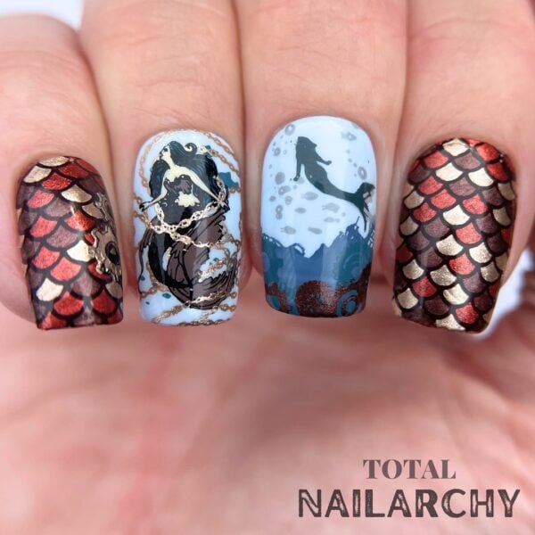 Adding a twist to classic mermaid nail designs, @total_nailarchy infuses a steampunk theme into their design. 
