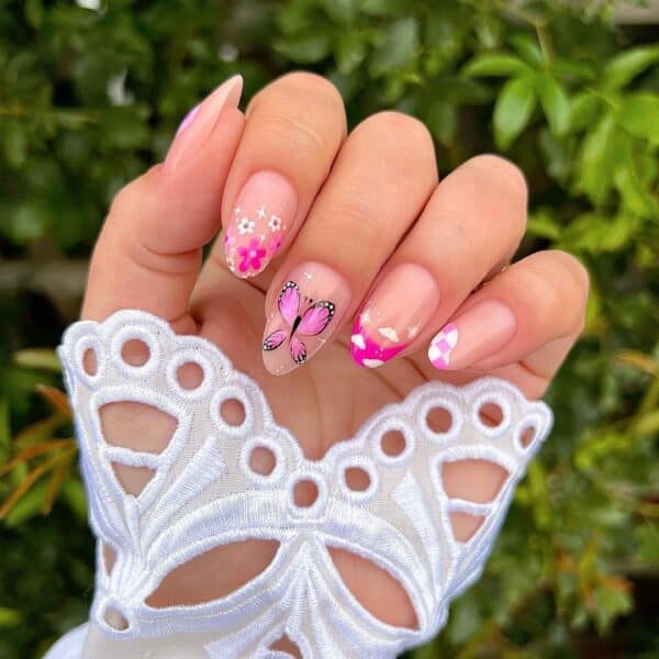 Faime Bass of @queenbcreative_ adds a Barbie twist to trendy nail art details.