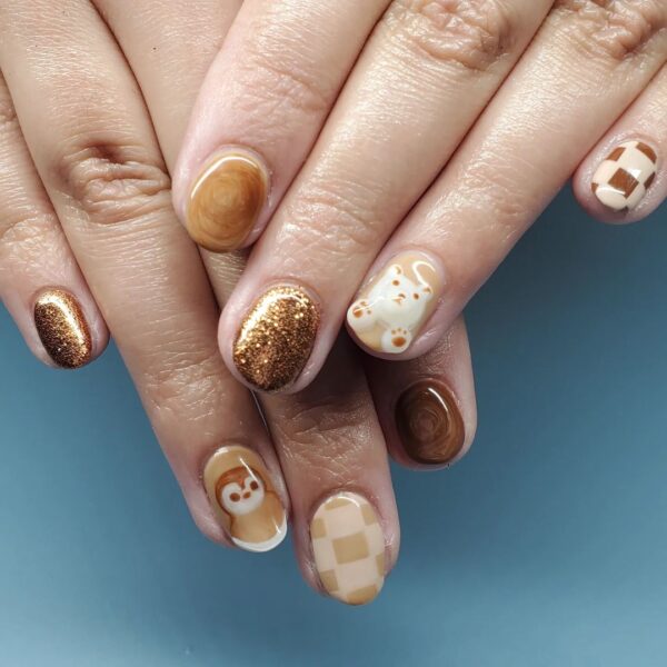Coffee art lovers, this nail design by Lulu of @glitterjellybean is for you!