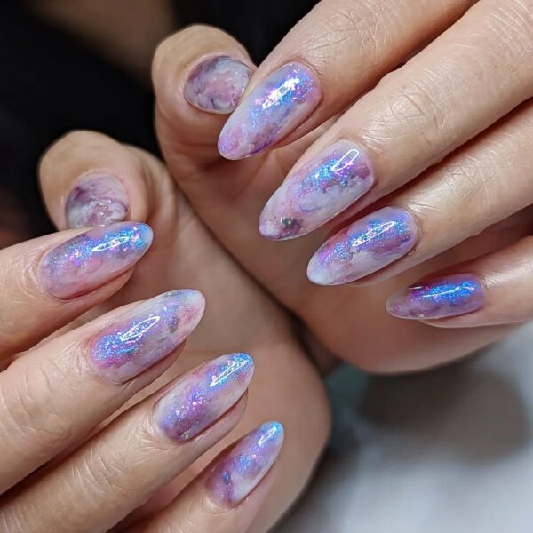 New York salon, @beautopia_serena, takes inspiration from @inspobynails for this glimmering purple look.