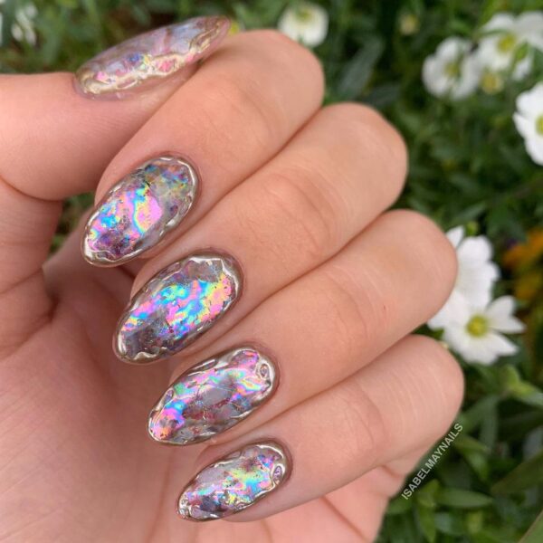These opal oyster nails were created by Sussex's @isabelmaynails.