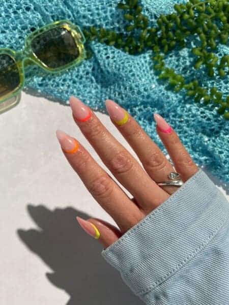 Nail art showcasing Hot, Mini Dress, Hypnotic and Vibes from the Neon Nights collection.