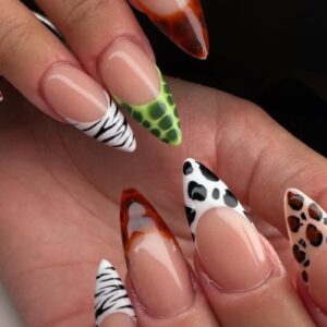 Animal print french tips by @karenmbrownnailartist