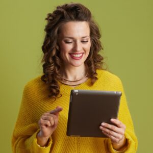 Woman on tablet happy