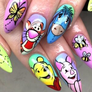 Winnie the Pooh nail gallery lead image courtesy of Instagram.com/baileebailsnails